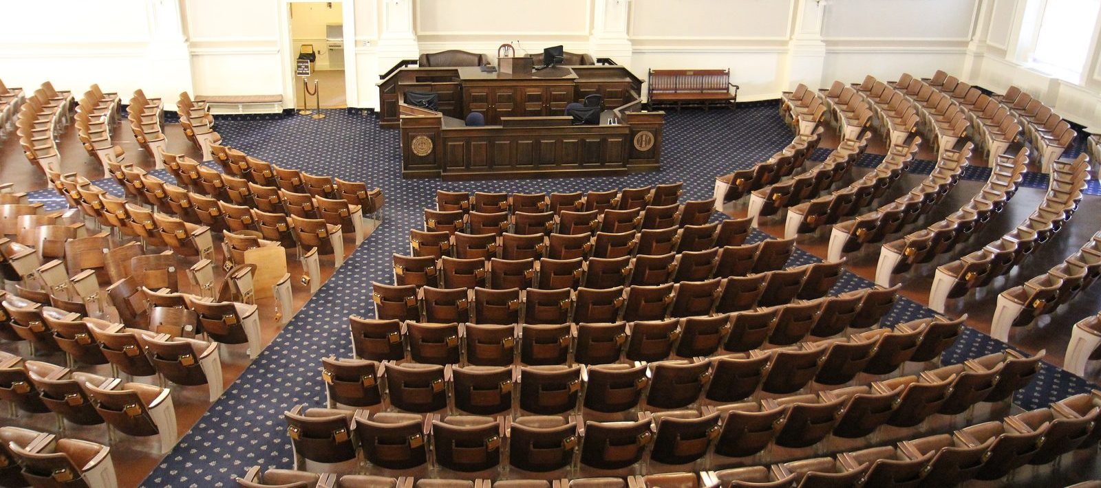Representatives Hall in the New Hampshire State House, its four hundred
           seats empty